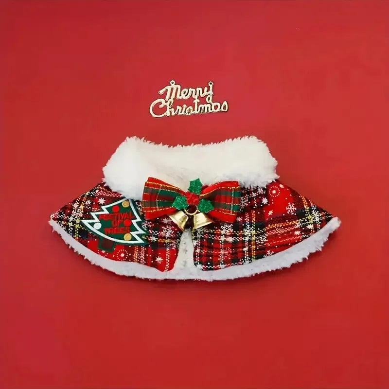 Red festive dog scarf with bell pattern tied around a pet's neck for Christmas.