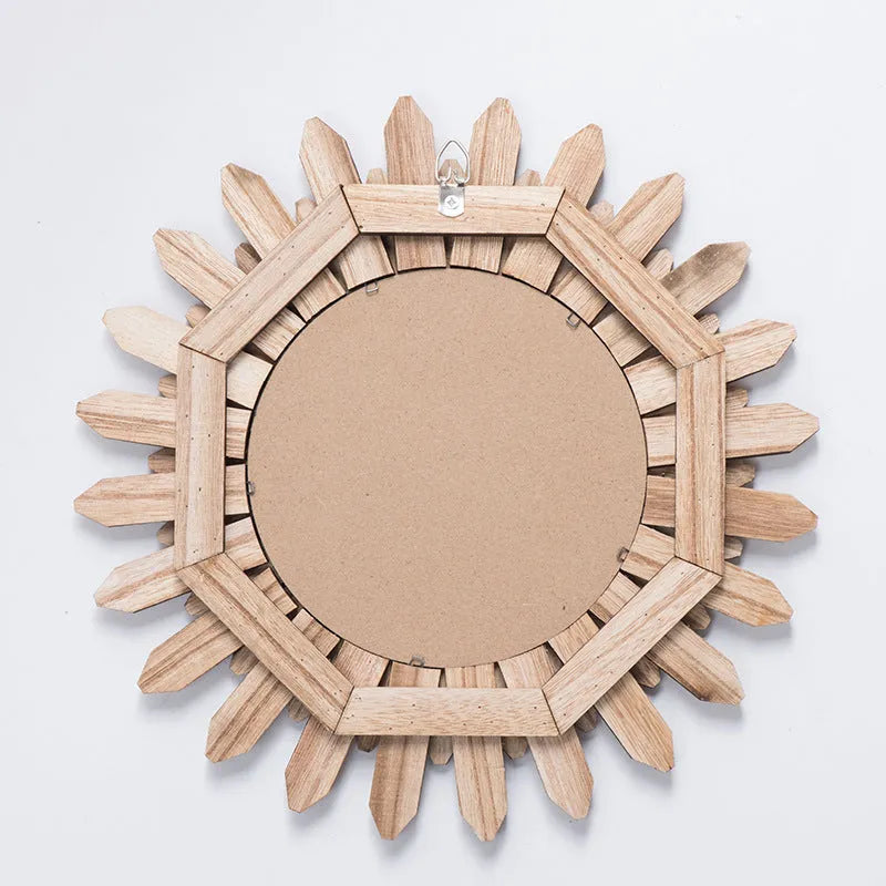 European-style round solid wood hanging mirror with a baked colour finish on a wall.