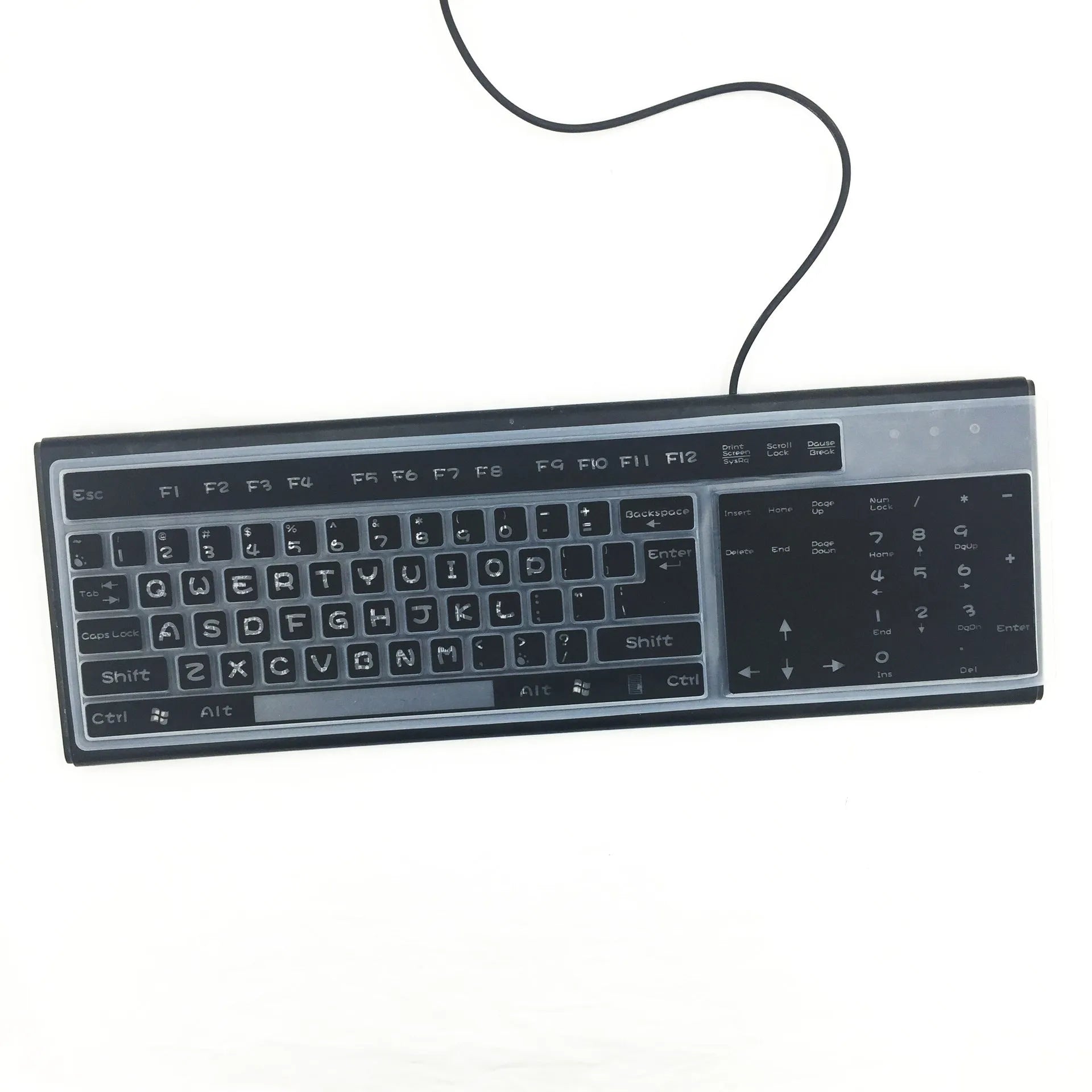 Transparent silicone laptop keyboard dust film on a notebook close-up