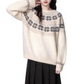 Milky White women's loose knit sweater with an all-over geometric Fair Isle pattern, crew neck, and long sleeves.