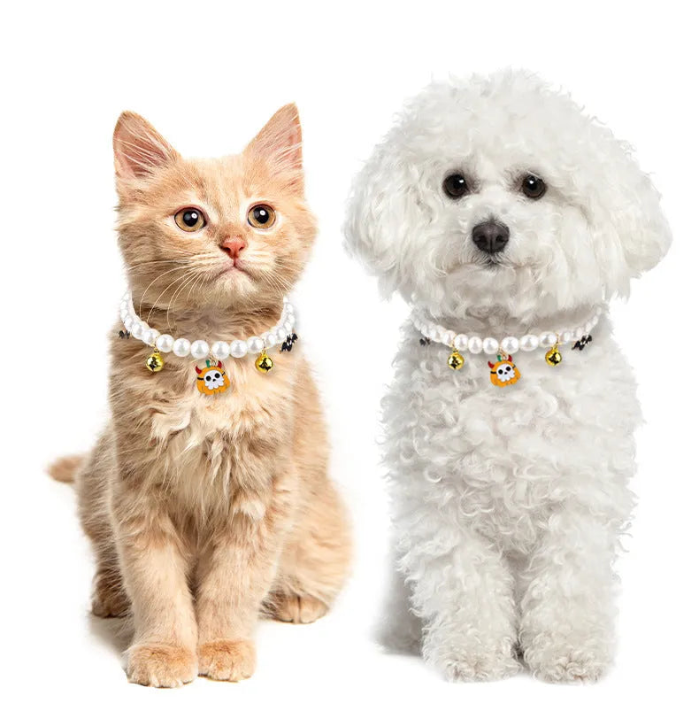 Three pet necklaces with pearl decoration and bells for cats and dogs
