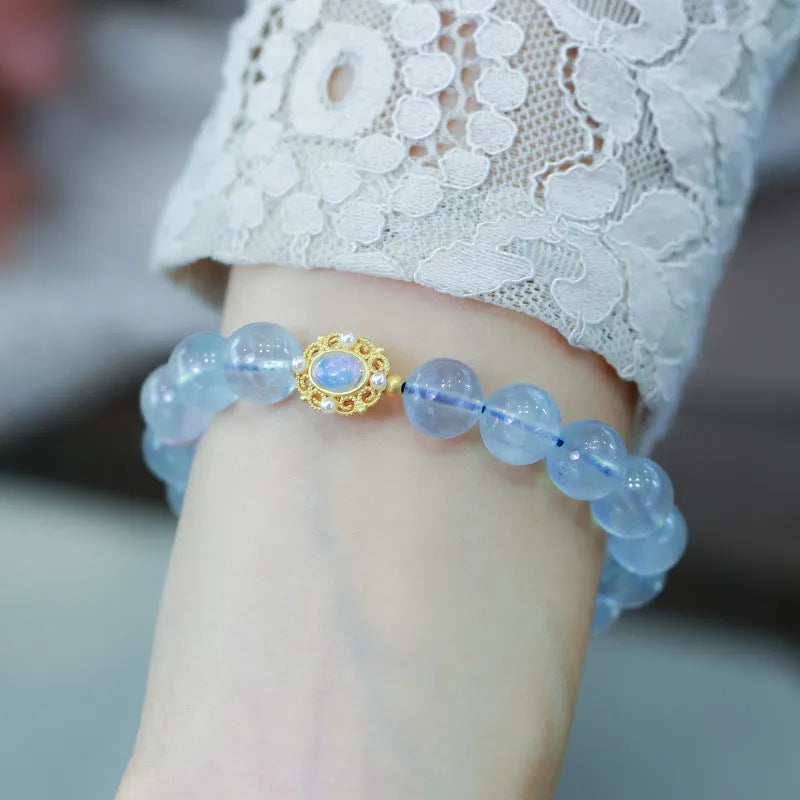 Aquamarine DIY bracelet for women with Fengjiu fox charm, showing pearl and crystal design options.