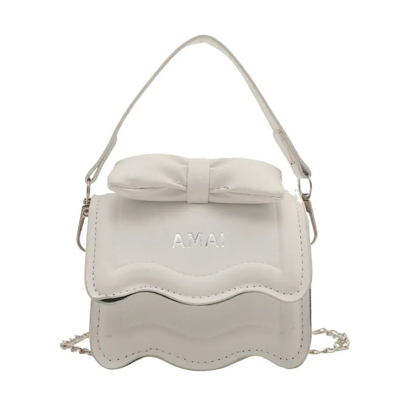 Mini PU crossbody handbag in multiple colours including black, pink, and silver