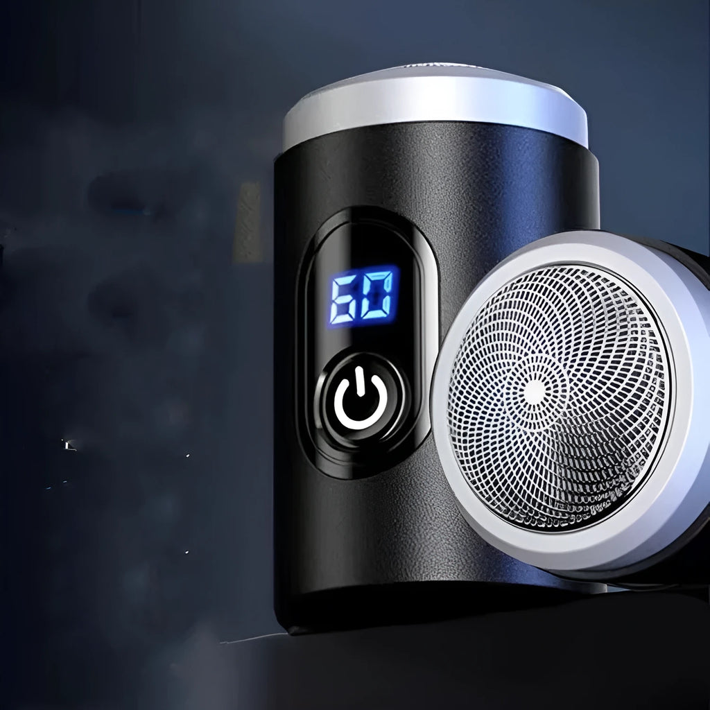 Black mini portable rechargeable electric shaver with USB cable and cleaning brush on a white background.