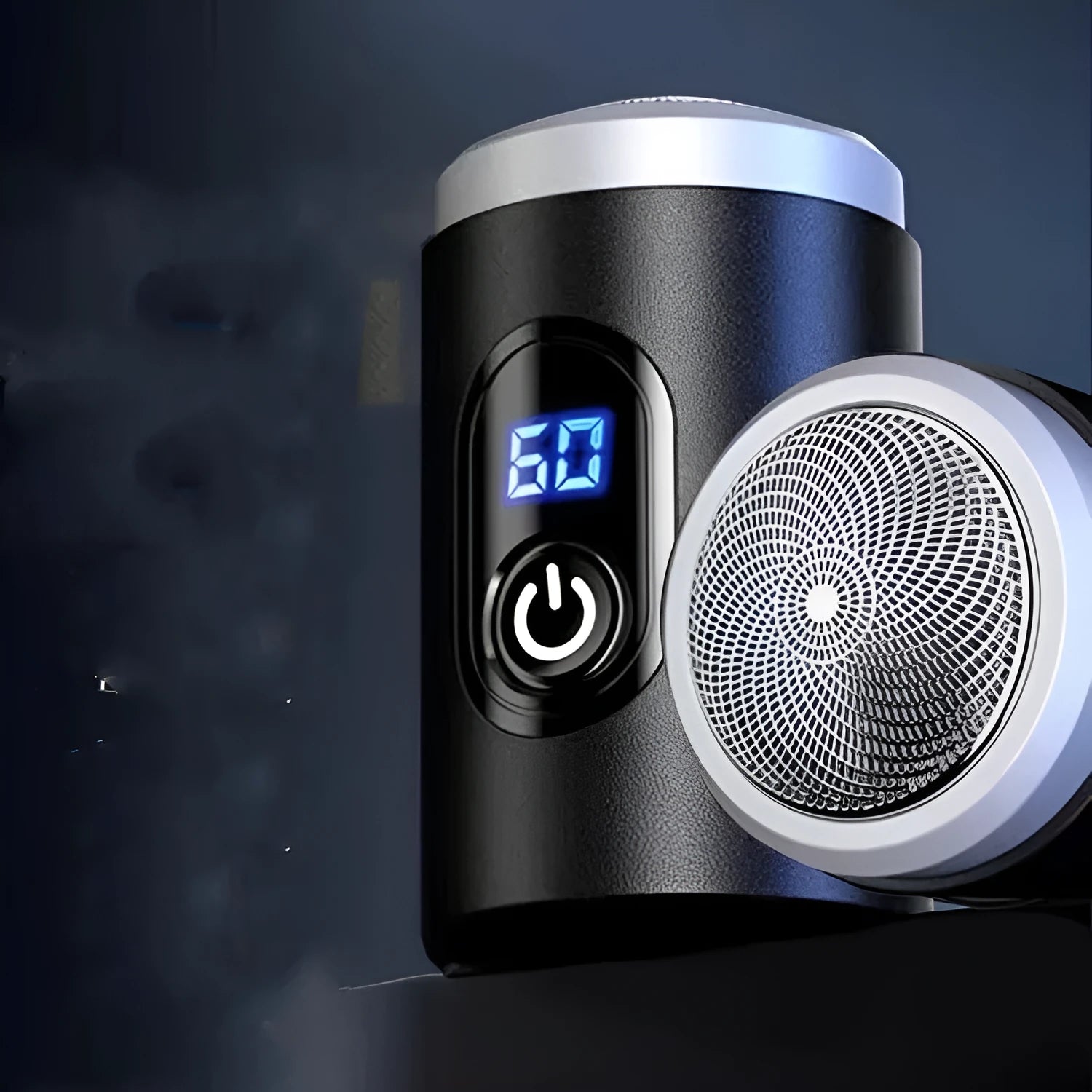 Black mini portable rechargeable electric shaver with USB cable and cleaning brush on a white background.