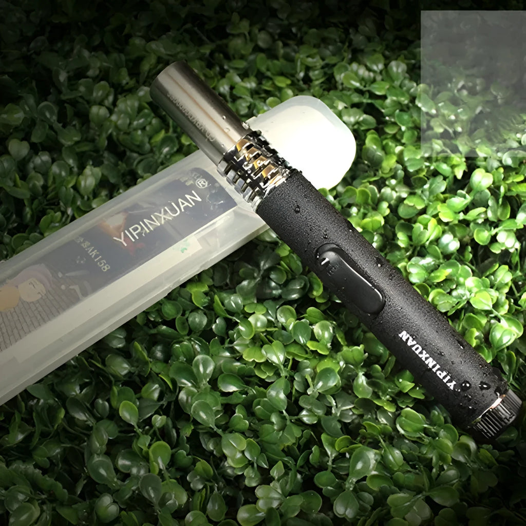Black portable metal flamethrower outdoor lighter with child safety lock for camping stoves.