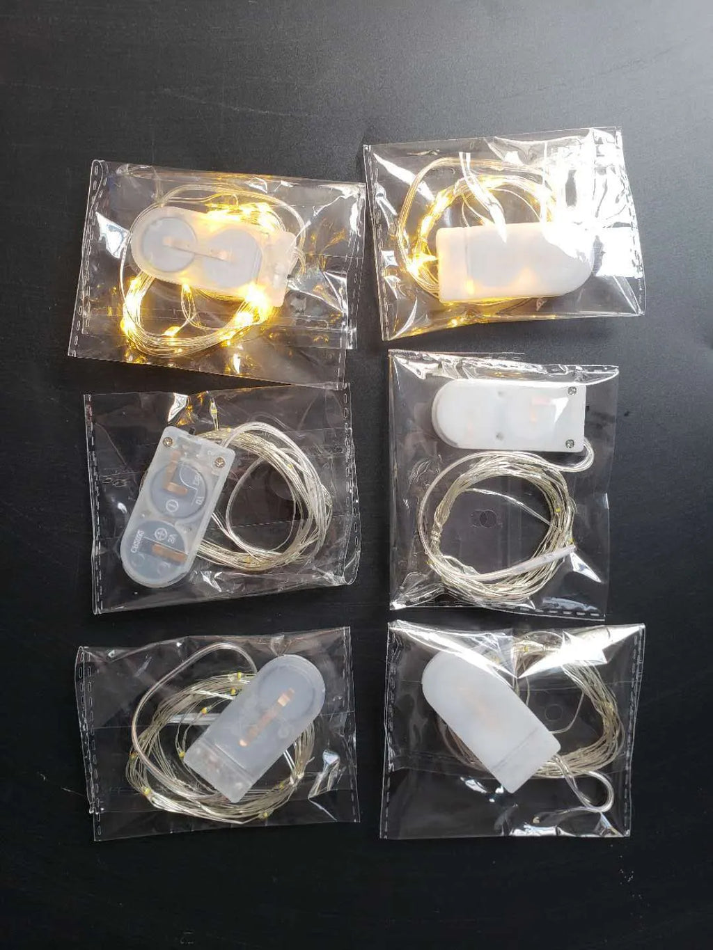 LED copper wire light string with battery box showing flexible 2 metre length with 20 white lights