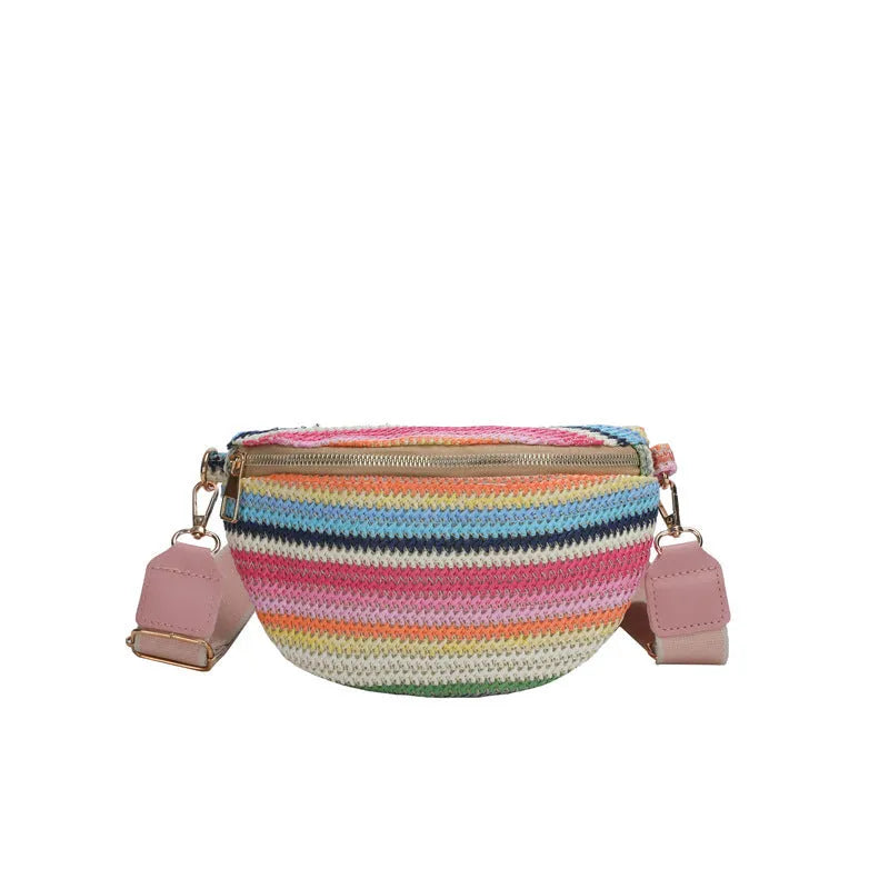 Blue woven straw beach bag with shell shape design and adjustable shoulder strap