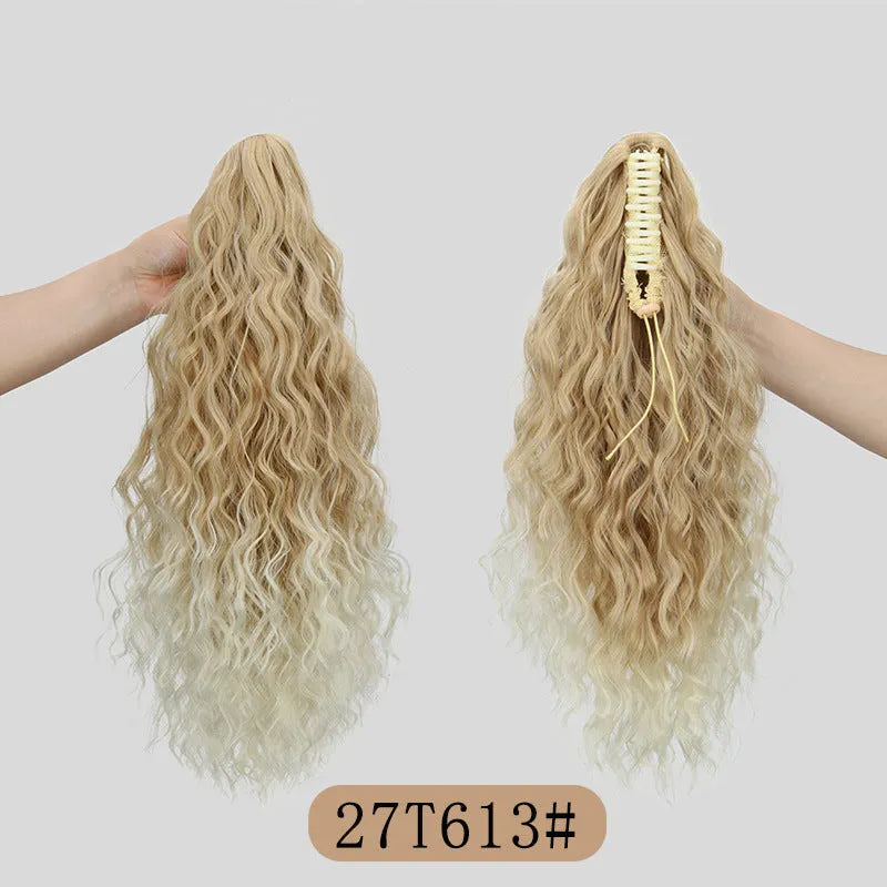 Synthetic corn curler wig with a textured water ripple grip ponytail, shown in a shade from the available colour range.