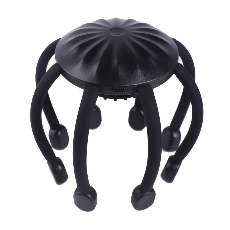 Black electric head massager with multiple silicone claws vibrating on scalp