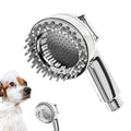 Silver dog shower attachment with silicone comb teeth and ergonomic grip for pet bathing