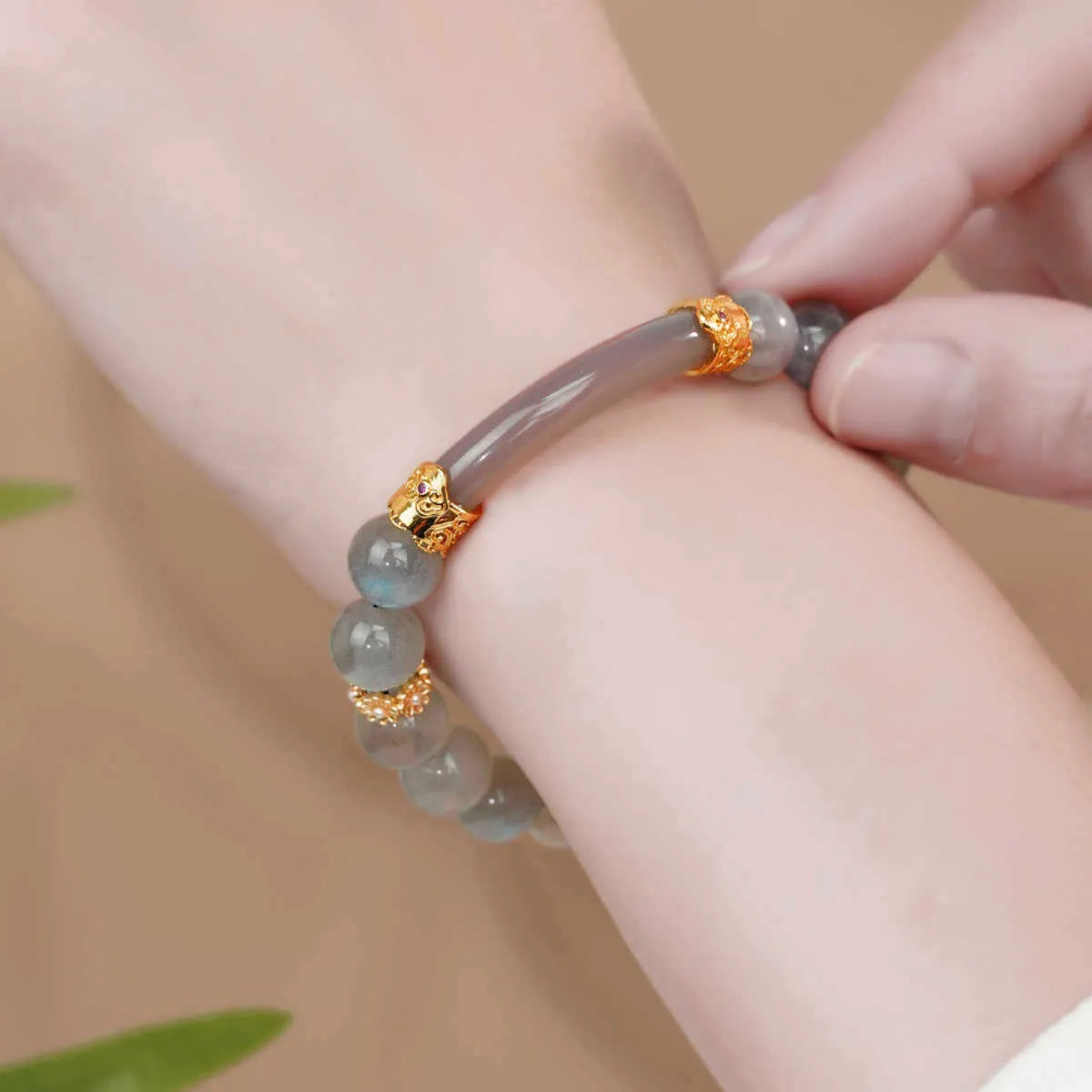 Gray moonstone women's half bracelet with 8mm round beads on wrist