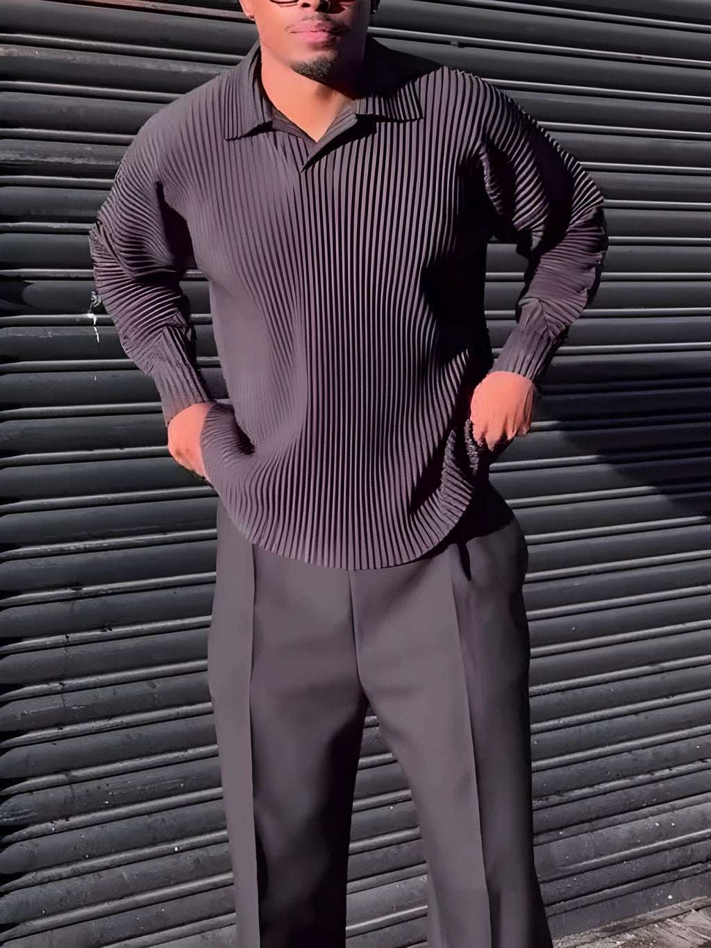 Man wearing a black pleated long-sleeved casual polyester top