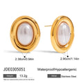 A pair of stainless steel vintage pearl stud earrings for women with a silver-toned finish and a fixed white pearl.