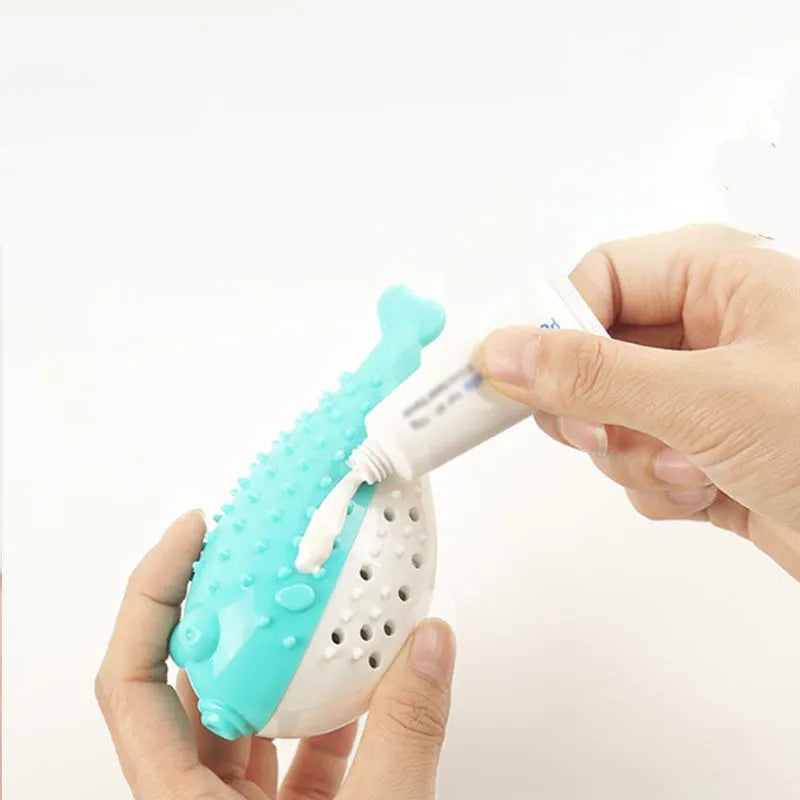 Blue silicone fish-shaped chew and teaser toy for cats on a plain background.