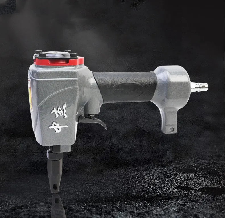 DK30 pneumatic metal sheet punching gun for industrial fabric applications.