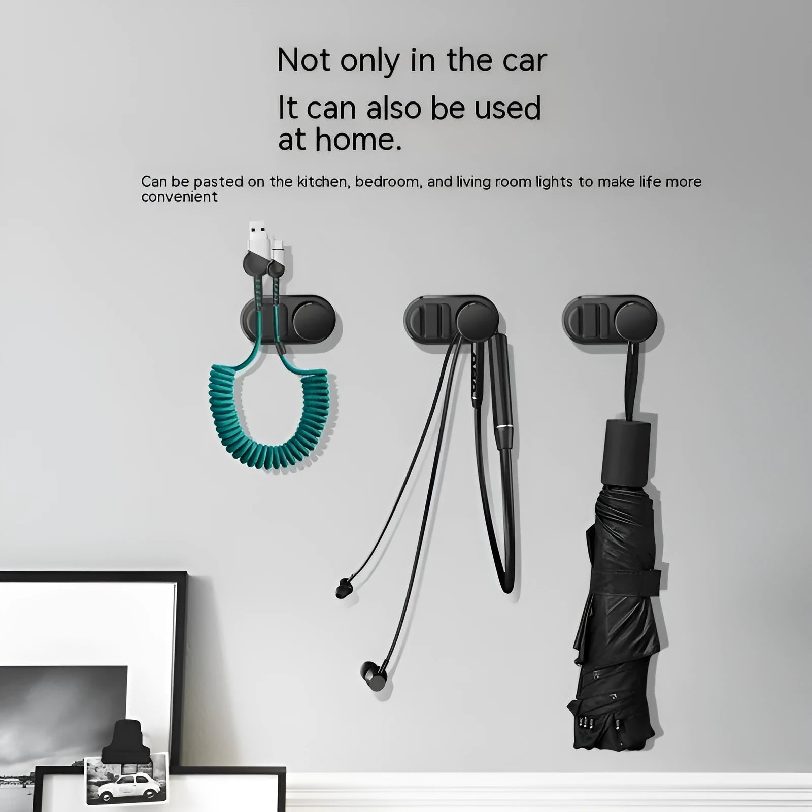 Car data cable storage hook in dark green with adhesive mount for vehicle organisation