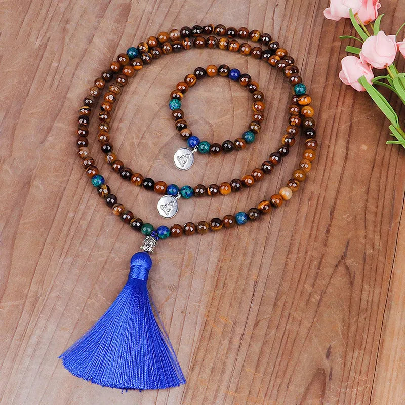 Handmade tiger eye stone bead necklace with Buddha head pendant and tassel on women model