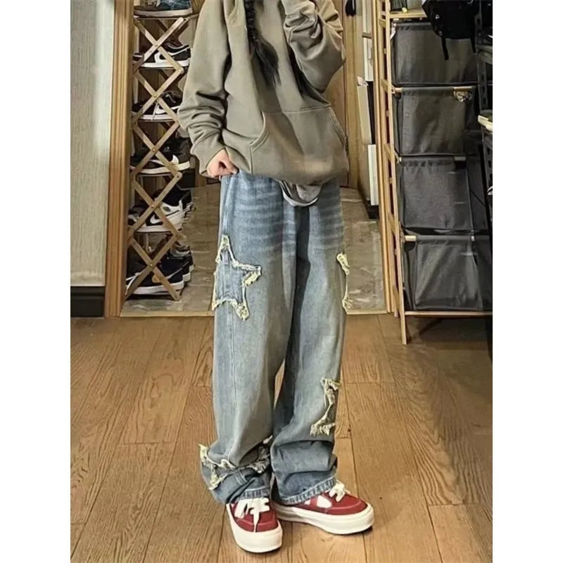 Blue denim women's jeans with high waist and wide straight leg cut