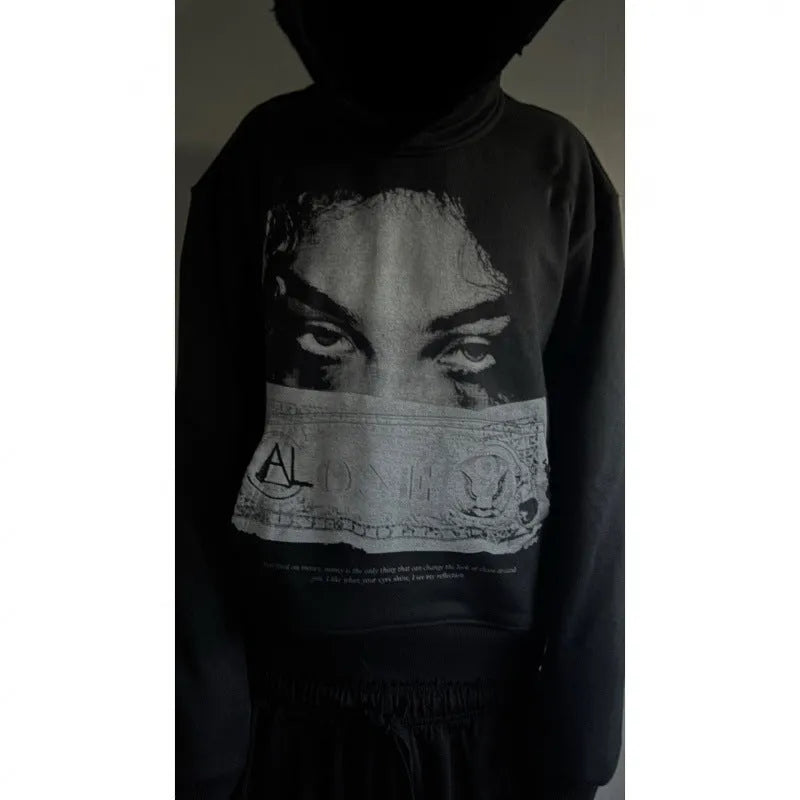 Black women's hoodie with dark cartoon print in loose polyester fabric