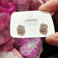 A pair of square geometric diamond earrings for women in an alloy metal, shown in silver and gold colour options.