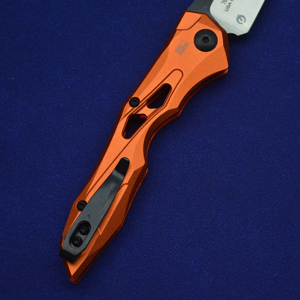 Black folding fruit knife with D2 steel blade and aluminium handle showing open and closed positions
