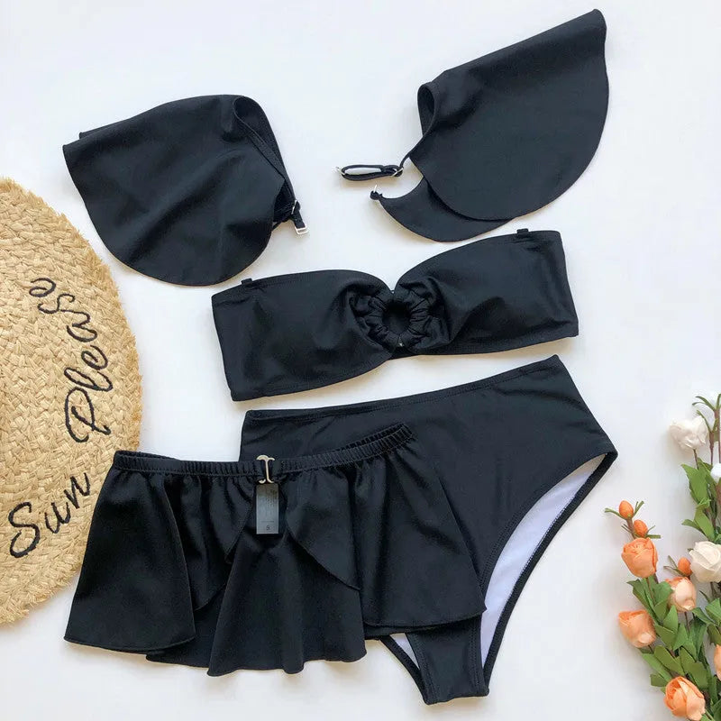Women's red three-piece flounced bikini set with ruffled bandeau top, high-waisted briefs, and sarong skirt