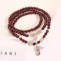 Original wine red garnet crystal flower bracelet with bohemian and ethnic design elements