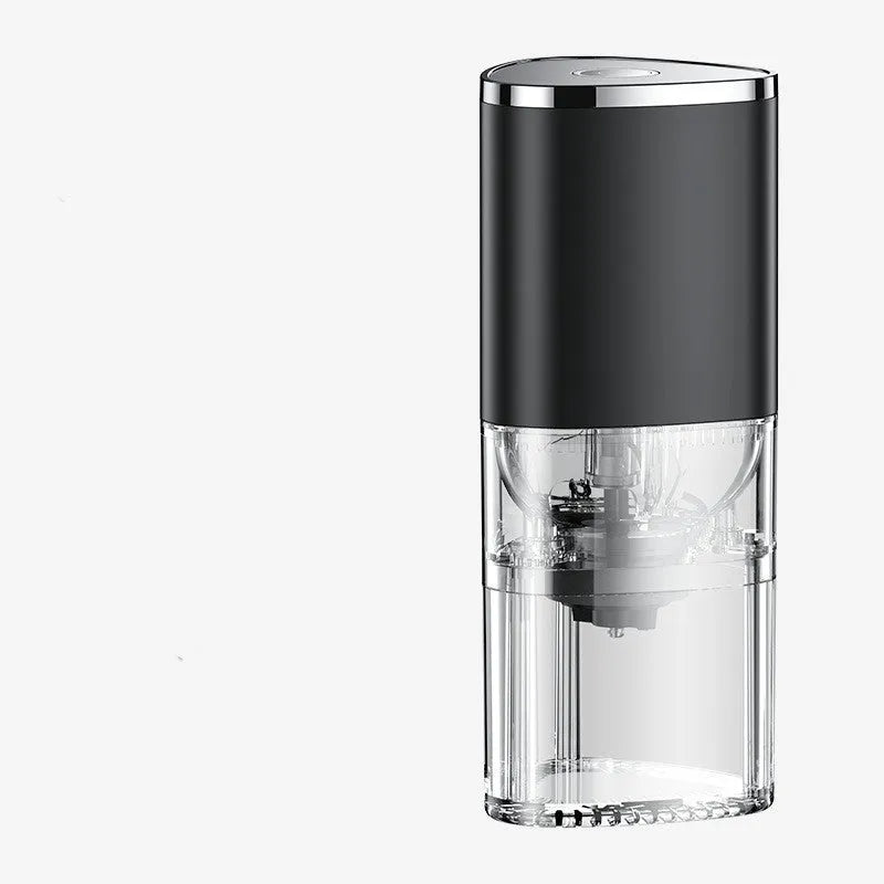 White and black portable electric coffee grinder with ceramic burr and USB charging cable.
