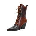 Women's dark brown retro pointed toe ankle boots with a chunky heel and side zip.