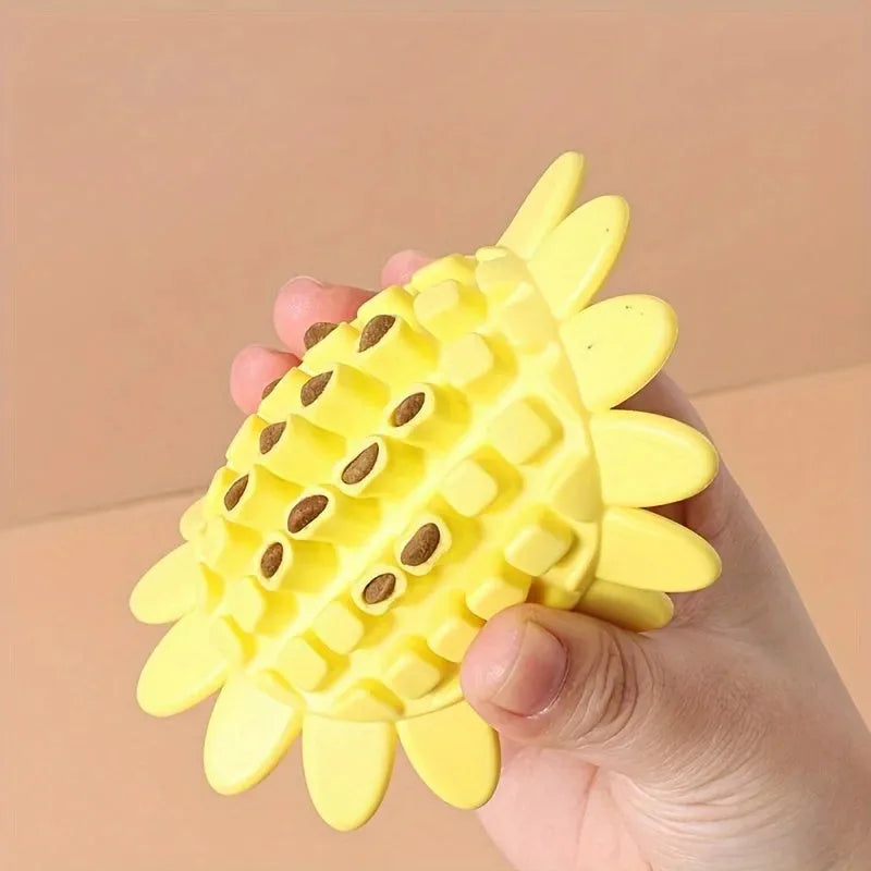 Yellow rubber sunflower-shaped dog chew toy for puppy teething and play