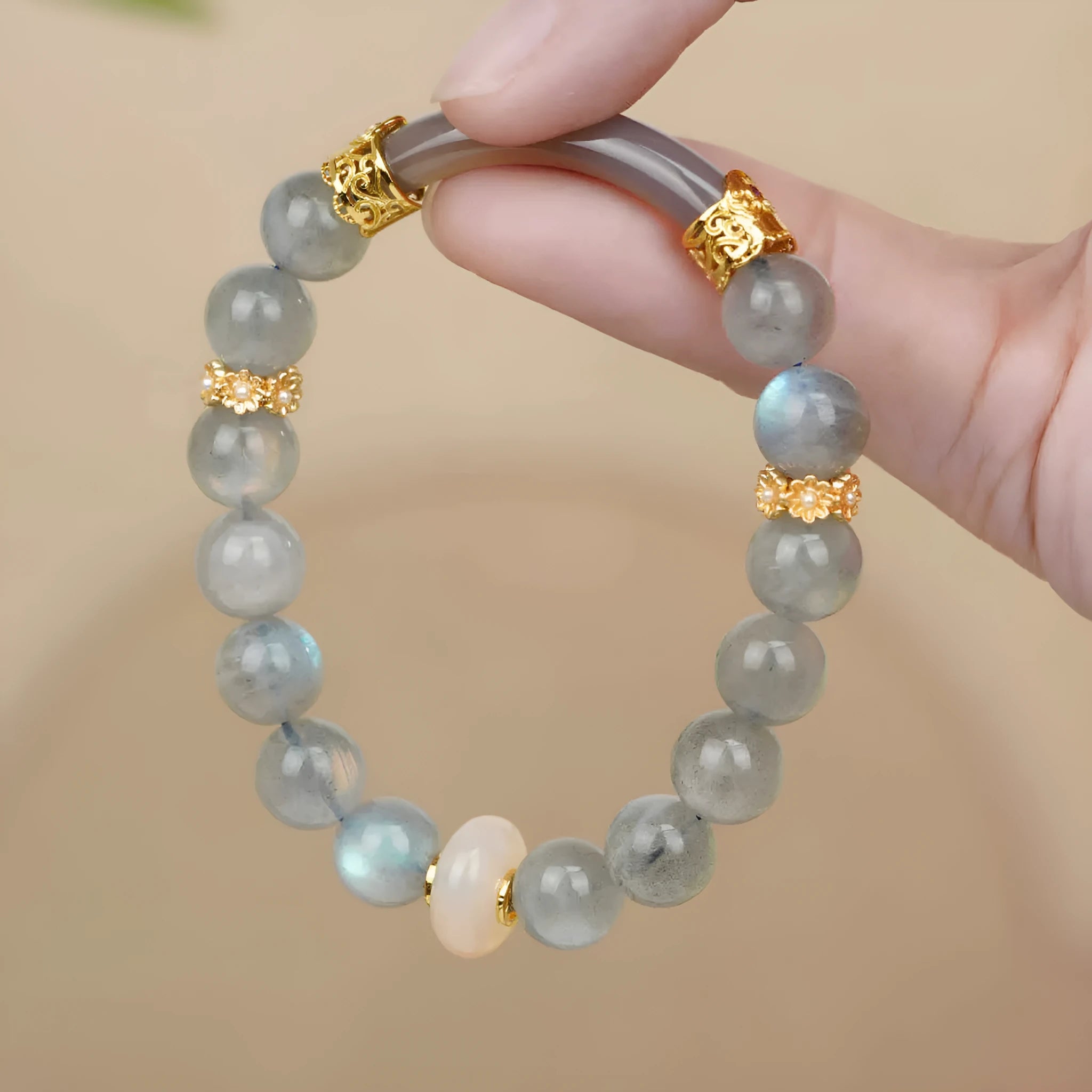 Gray moonstone women's half bracelet with 8mm round beads on wrist