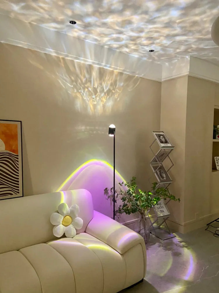 Modern Sunset Red floor lamp projecting a water wave light pattern onto a floor.