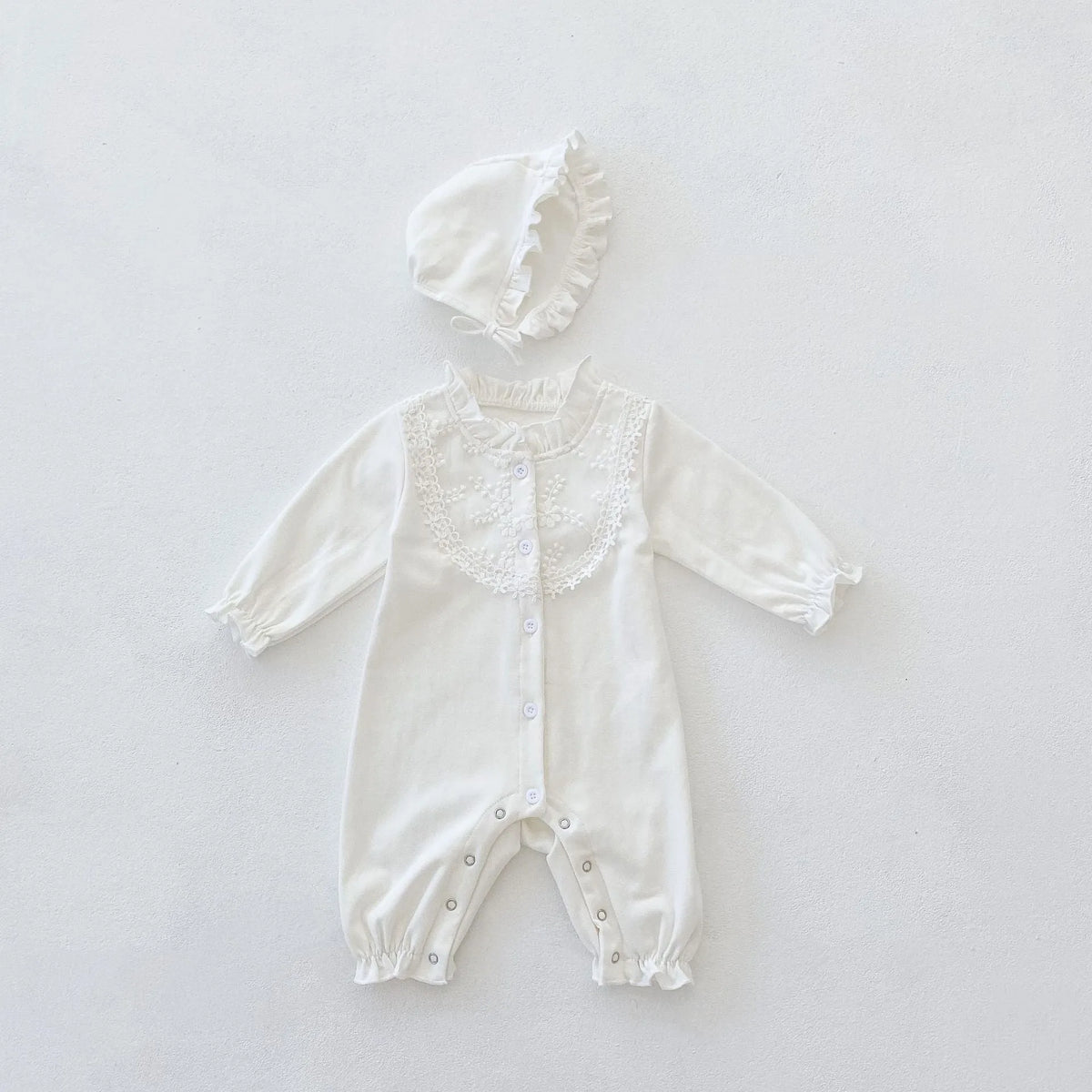 Beige knitted cotton hooded jumpsuit with wooden ear collar and lace, long sleeve, for baby and toddler autumn wear.