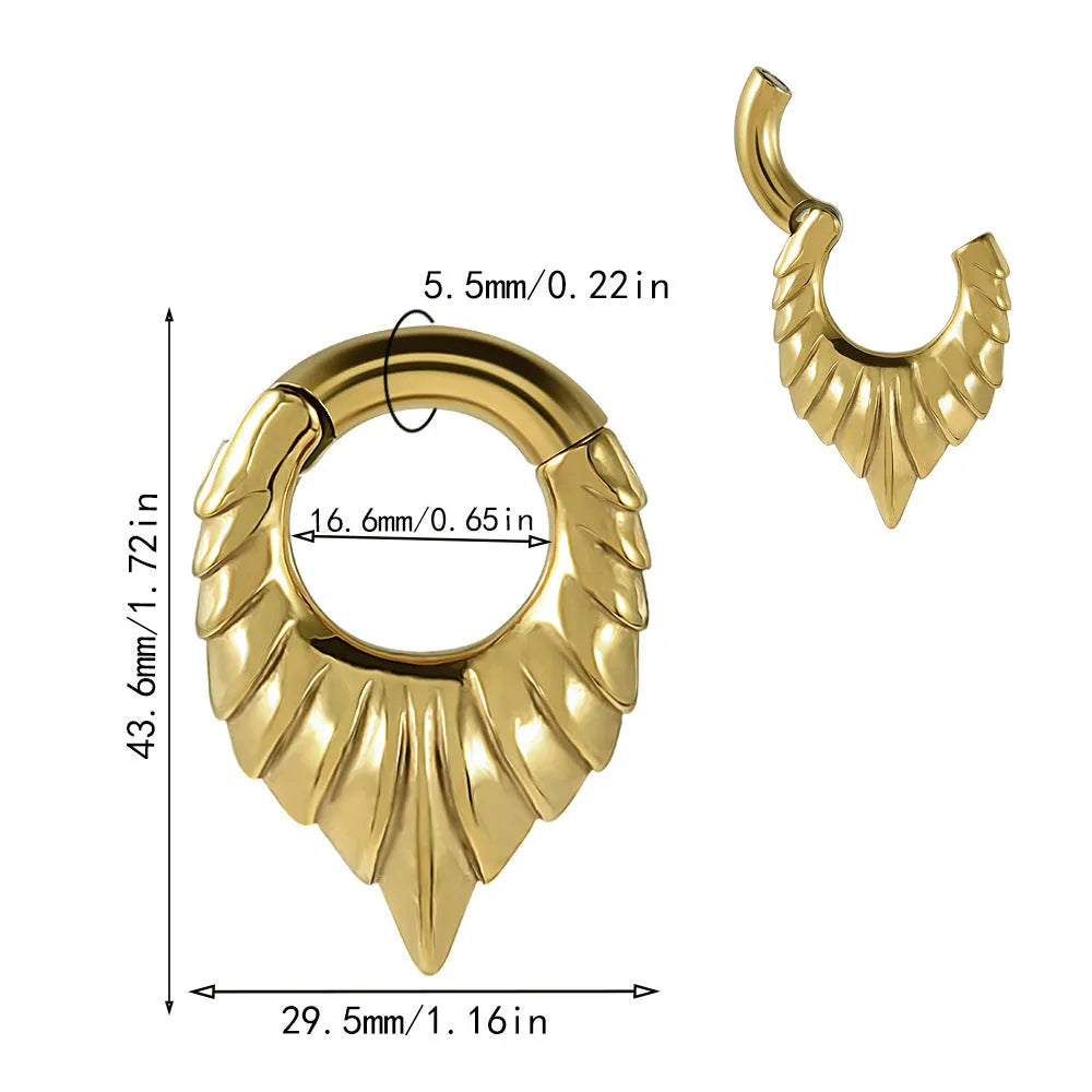 A single stainless steel teardrop-shaped ear extender for stretched lobes, showing a totem pattern on its face.