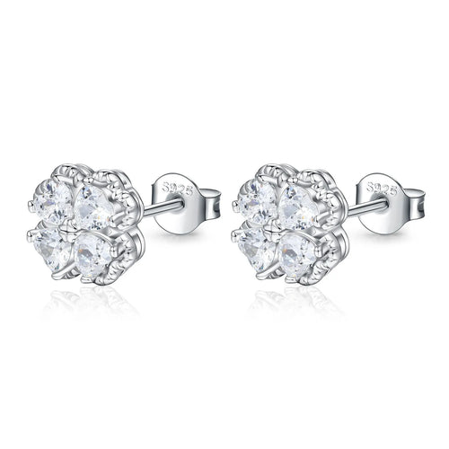 A pair of 925 silver earrings with a heart and four-leaf clover design, set with zircon stones in a white gold colour finish.