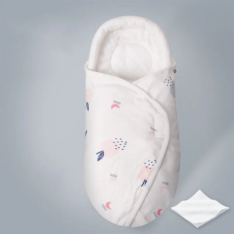 Cotton baby anti startle swaddle measuring 30 by 60 centimetres in a colourful print design.