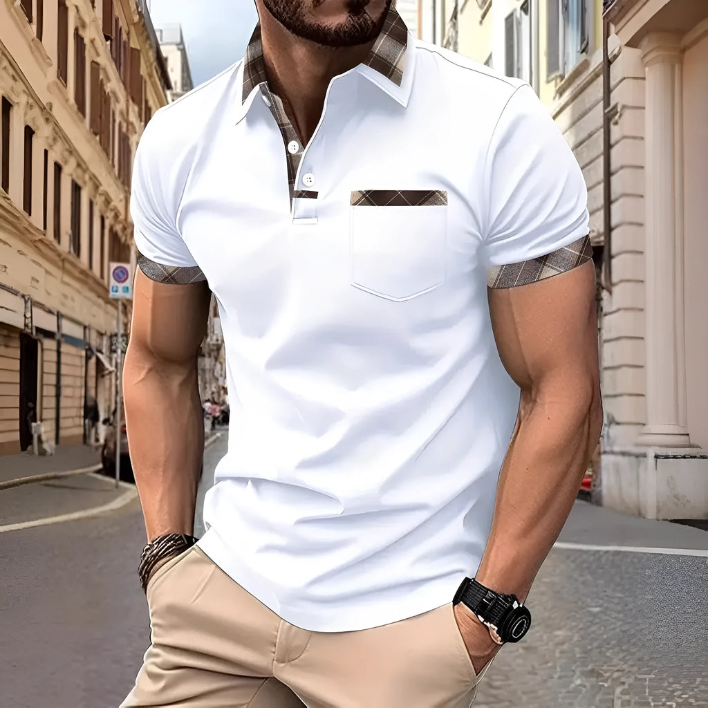 Man wearing a short sleeve plaid colourblock T-shirt with zipper detail on a white background.