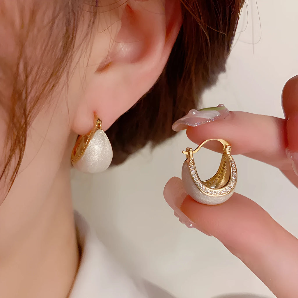 Pair of retro copper earrings with micro-inlaid drip oil design and thick real gold plating in geometric shape
