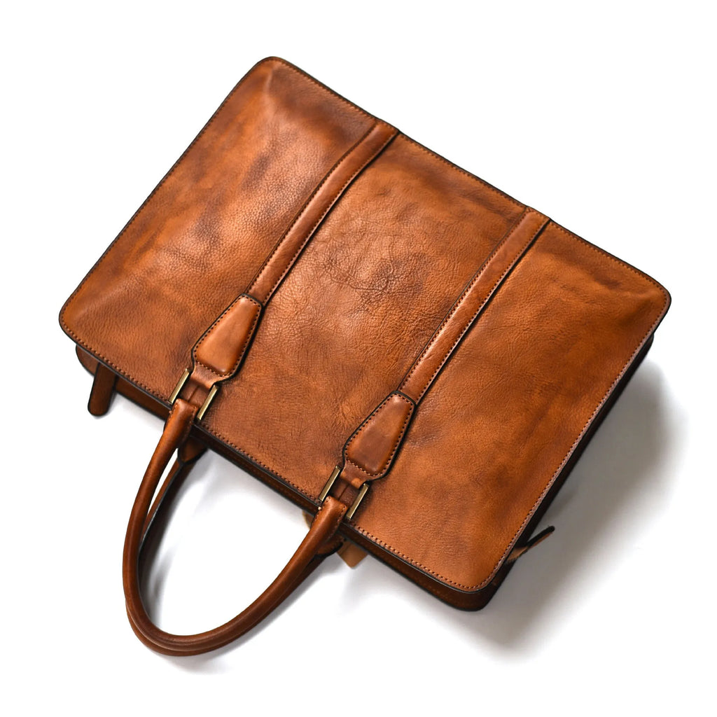 Men's brown leather handbag with horizontal square design and zipper closure