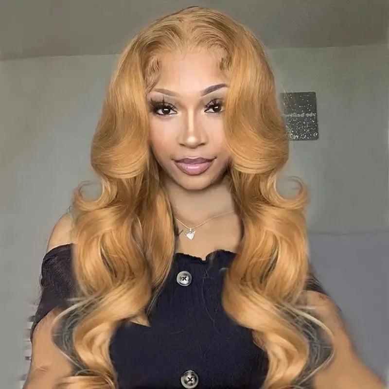 Long light brown curly wig with golden big waves and side bangs on a mannequin head.