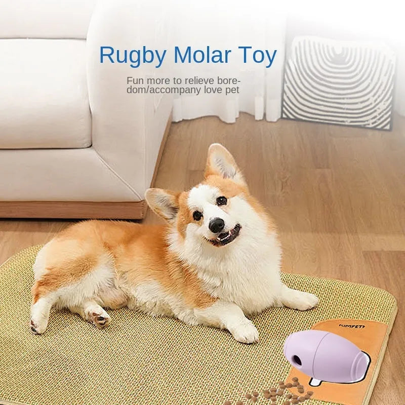 Blue silicone rugby ball shaped dog chew toy for boredom relief and interactive feeding.
