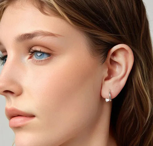 Heart shape love ear clip in 925 silver with polished finish and interwoven design for women