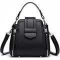 Small square vertical women's handbag in soft textured PU leather, shown in multiple colour options.
