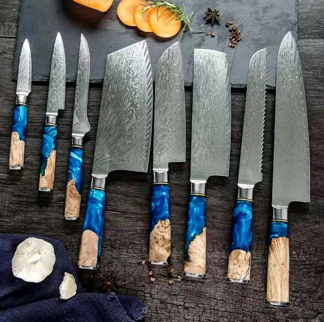 Seven-piece kitchen knife set with Japanese steel blades and ergonomic wood-resin handles on a cutting board.