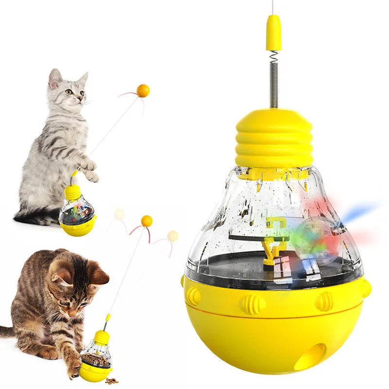 Electric yellow cat interactive toy wand with slow food dispenser, teaser stick, ball, and ribbon.