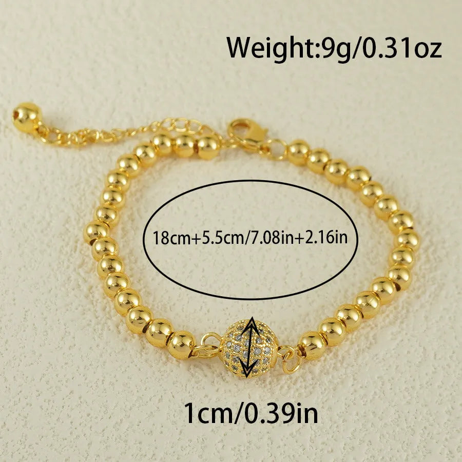 Women's copper bracelet with a heart-shaped design and a single ball zircon detail.