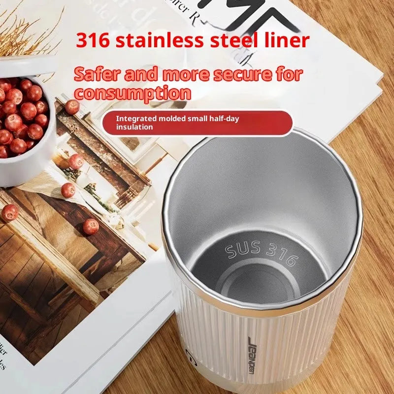 Fully automatic mixing cup in 316 stainless steel with 400ml capacity and removable base in white colour