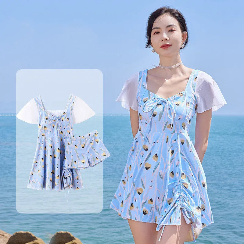 Sea salt blue floral pattern women's one-piece swimsuit on a hanger