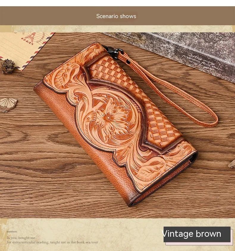 Brown tri-fold leather wallet with deep embossed floral pattern, shown open to reveal card slots and lining.